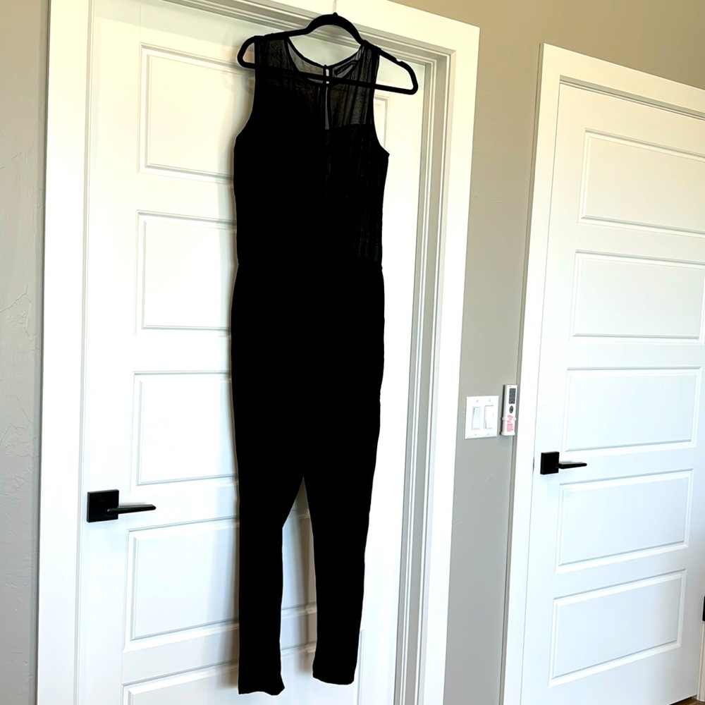 Black jumpsuit..